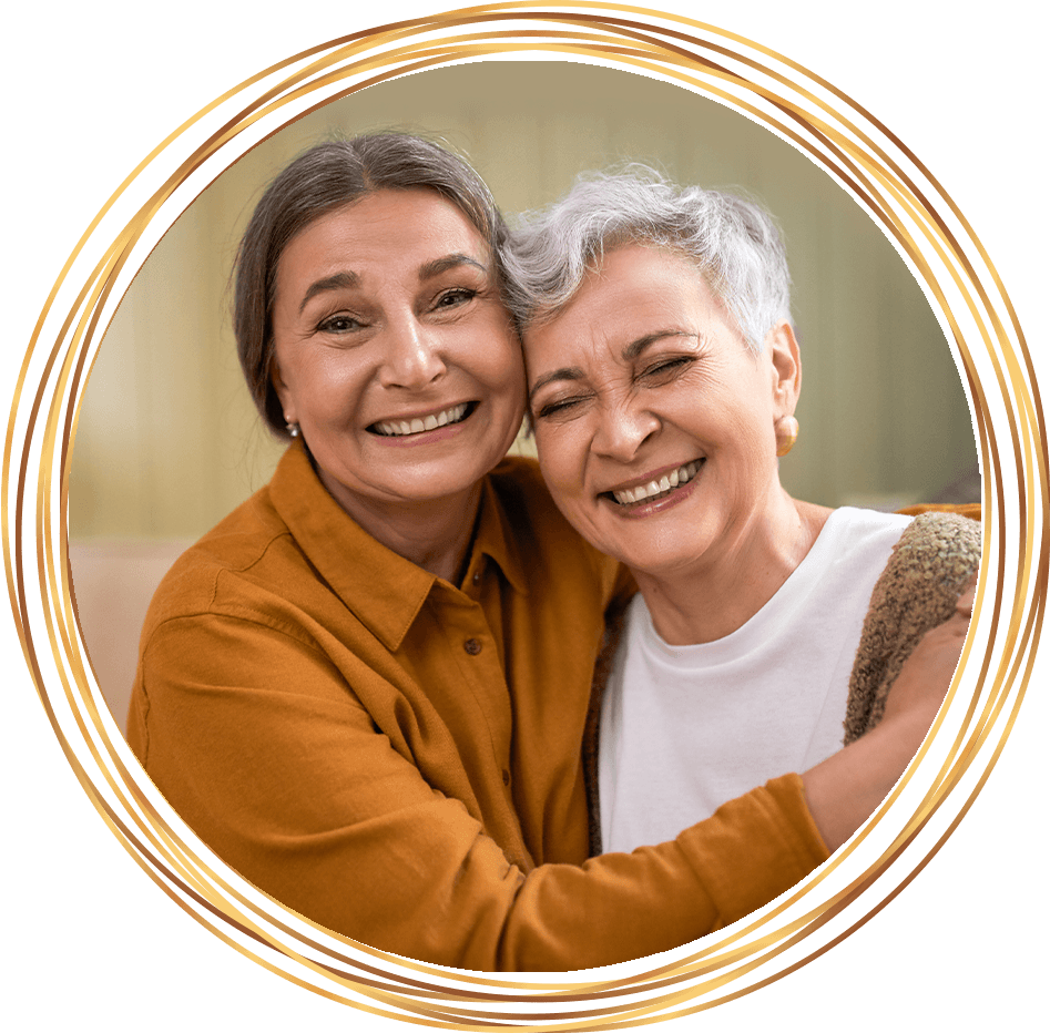 older women smiling and hugging